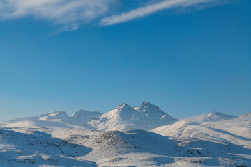 Fototapeta na wymiar Beautiful winter landscape. Snow covered mountains. Aragats, Armenia