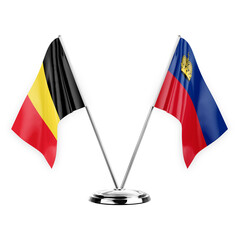 Two table flags isolated on white background 3d illustration, belgium and liechtenstein