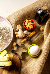 Gingerbread ingredients and accessories for making ginger dough.