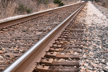 Railroad Track Stretches Straight Into the Distance