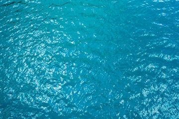 Blue water in the pond texture drone view.