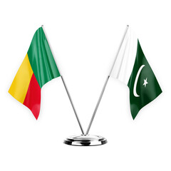 Two table flags isolated on white background 3d illustration, benin and pakistan