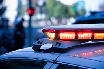 Detail view of illuminated police lights.
