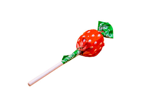 Norwich, Norfolk, UK – December 2021. Swizzels branded classic and retro strawberry flavoured lollipop cut out isolated on a plain white background