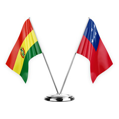 Two table flags isolated on white background 3d illustration, bolivia and samoa