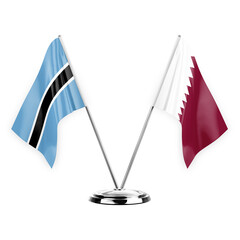 Two table flags isolated on white background 3d illustration, botswana and qatar
