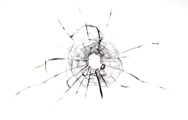 Black cracks from kulsi in glass on a white background. Macro.