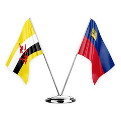 Two table flags isolated on white background 3d illustration, brunei and liechtenstein