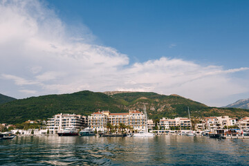 Fototapeta na wymiar View from the sea to the Regent Hotel in Porto. Montenegro