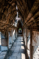 Corridor with false arch inside the Bayon temple in Angkor 