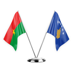 Two table flags isolated on white background 3d illustration, burkina faso and kosovo