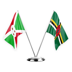 Two table flags isolated on white background 3d illustration, burundi and dominica