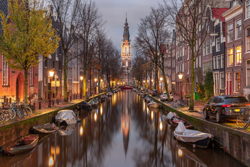 Fototapeta na wymiar Evening Amsterdam canal Groenburgwal with Zuiderkerk, southern church, Holland, Netherlands.