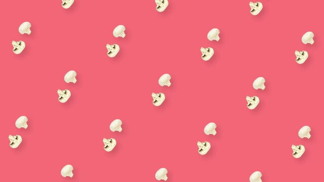 Colorful pattern of fresh rotating mushrooms. Seamless pattern with champignon sliced. Realistic animation. 4K video motion