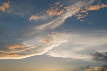 Fototapeta na wymiar Beautiful cloudscape with unique shape in summer evening