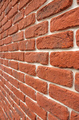 Clinker brick of red color. Tiles for the exterior of the facade of the house. Textured surface...