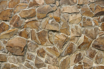 Texture of a stone wall. Old stone wall as a background or texture.