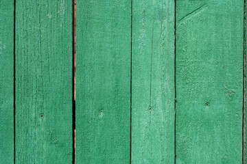 Background image of a green painted wooden fence texture