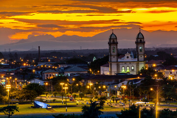 Obraz premium Panoramic view of the city of Iguape, in the state of Sao Paulo, one of the oldest in Brazil, highlighting the Lord Bom Jesus Sanctuary at afternoon