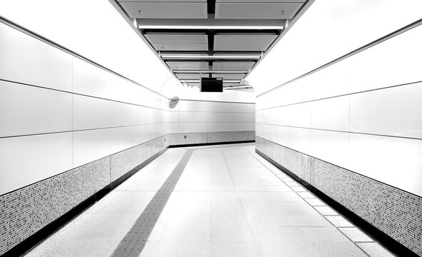 The Exit Of The Hong Kong Subway Station And Nobody In There. Style Of Photo Is Black And White And Futuristic.