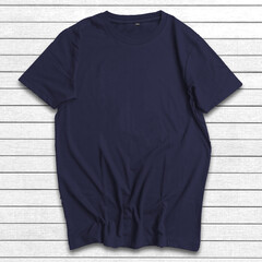 Mockup Of T-shirt Lay Flat On White Wooden Background