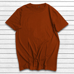 Mockup Of T-shirt Lay Flat On White Wooden Background