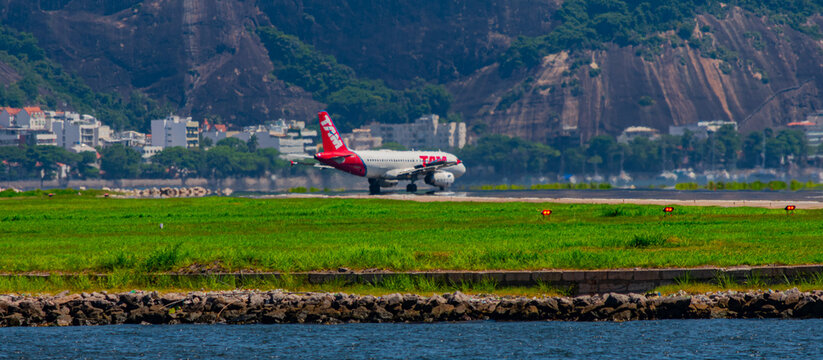 Rio de Janeiro, Brazil - CIRCA 2020: Brazilian commercial plane taxiing on the runway at Santos Dumont national airport