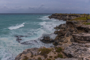 Beautiful view of rocky cliff at sunrise on the the southern part of the Isla Mujeres in Caribbean, Mexico