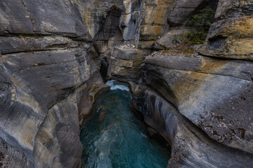 The Mistaya River flows through Mistaya Canyon in Banff National Park, Alberta Canada