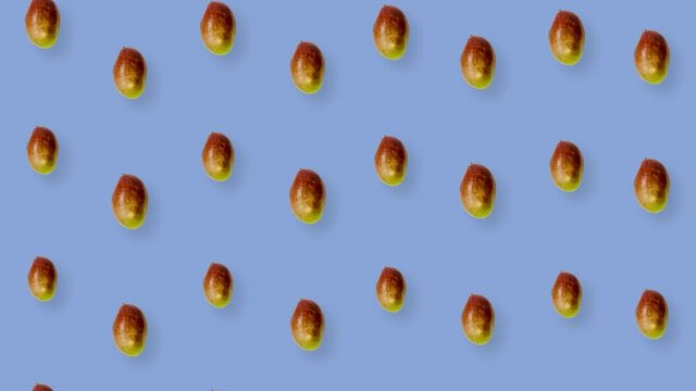 Colorful fruit pattern of fresh mango on purple background. Seamless pattern with mango. Realistic animation. 4K video motion