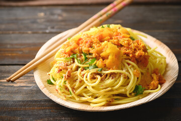 Noodles Tai Yai style mixed with spicy tomatoes and minced pork sauce, Tai Yai food in Northern of Thailand