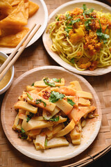 Spicy fresh Burmese tofu salad, deep fried Burmese tofu and noodles, Tai Yai food in Northern of Thailand