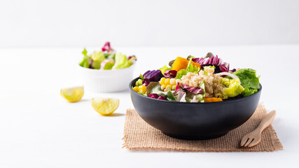 Fresh organic vegetables salad with quinoa seed in bowl on white background, Healthy Vegan food