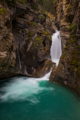 Fototapeta na wymiar Waterfall in Johnston Canyon, Canada