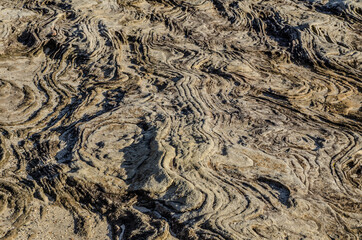 Fototapeta na wymiar Natural Waves pattern on stone surface.