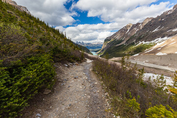 Hiking above the tree line to the Plain of Six Glaciers at Lake Louise in the Canadian Rocky Mountains