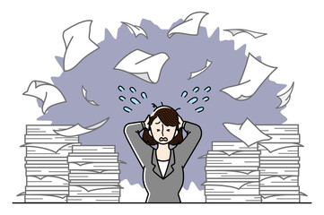 大量の仕事に追われているビジネスウーマン