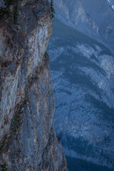 Fototapeta na wymiar Climber on a side of Tunnel mountain, Banff