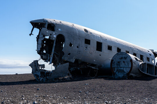 Impressive view of the Sólheimasandur Plane Wreck, the Remains of a 1973 U.S. Navy DC plane that crashed on black sand beach in Iceland