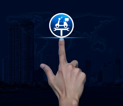 Hand pressing service fix motorcycle with wrench tool flat icon over world map, modern city tower and skyscraper, Business repair motorbike service concept, Elements of this image furnished by NASA