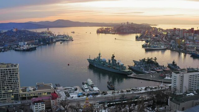 City center on the slopes of the hills and the central square at sunset