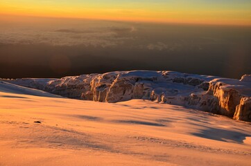 Naklejka na ściany i meble glacier on mount kilimanjaro. Uhuru peak. Top of Africa. Trekking to the highest mountain. Fantastic view. tanzania, Rebmann Gletscher
