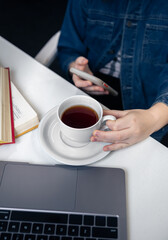 Cup of tea in the child's workplace, education and lessons.