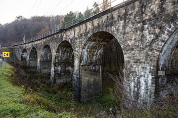 Fototapeta na wymiar Old stone arched bridge-viaduct, Ternopil region, Ukraine