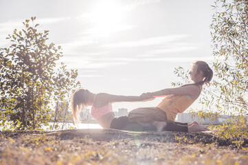 Massage expert adequately performs a great massage on the forest ground.