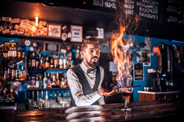 Barman mixes a cocktail in the brasserie