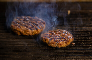 Image of hamburger meat cooked on the grill