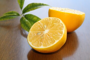 Lemons fresh fruits on wooden background