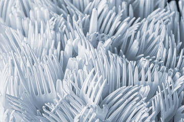 Obraz premium white plastic fork for background or texture