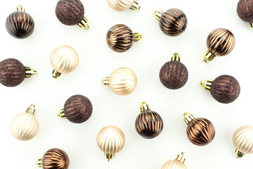 Shiny brown christmass tree decoration isolated on white background. Balls seamless pattern background